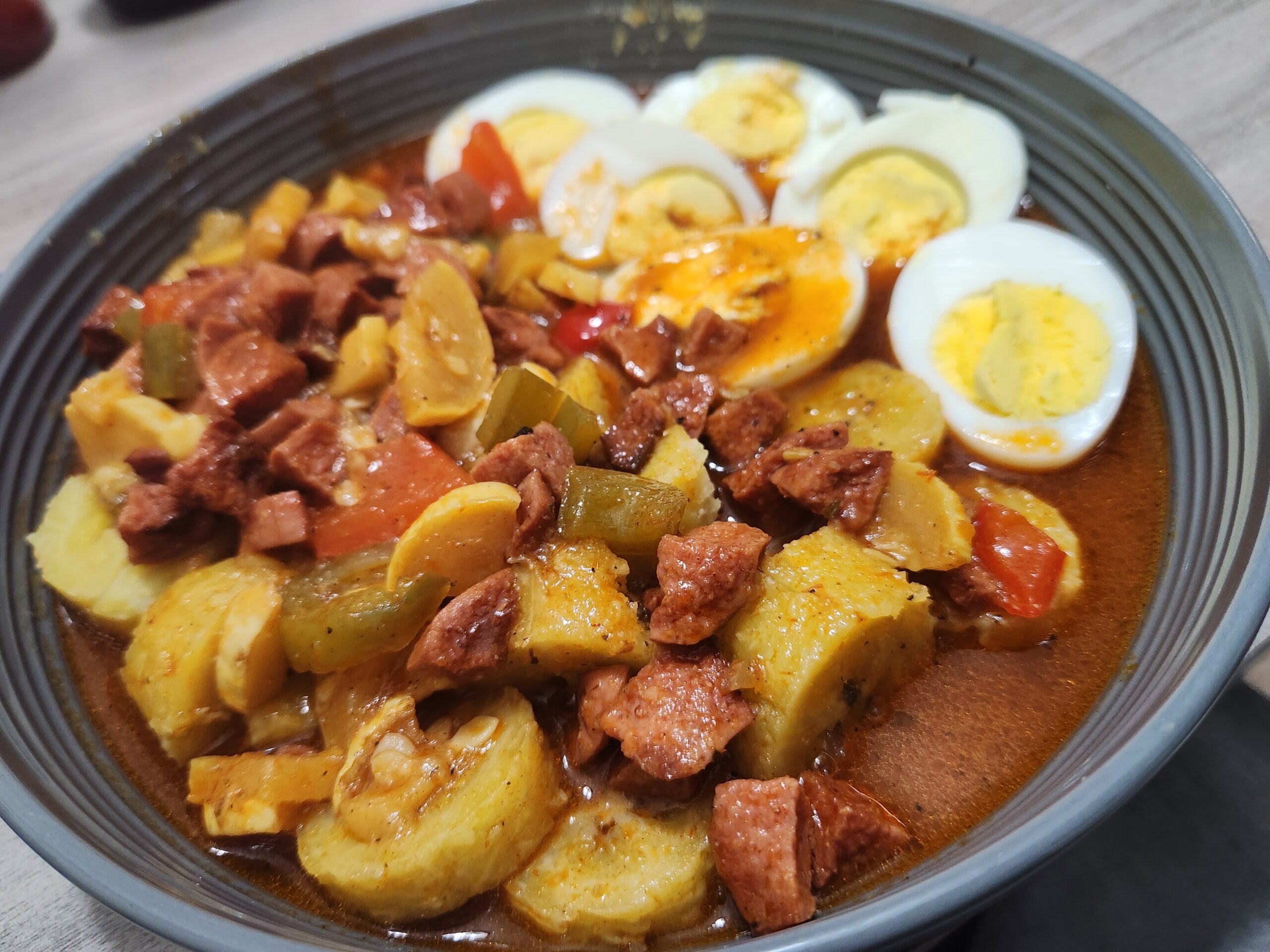Haitian breakfast boil eggs and sauces hotdog & plantain