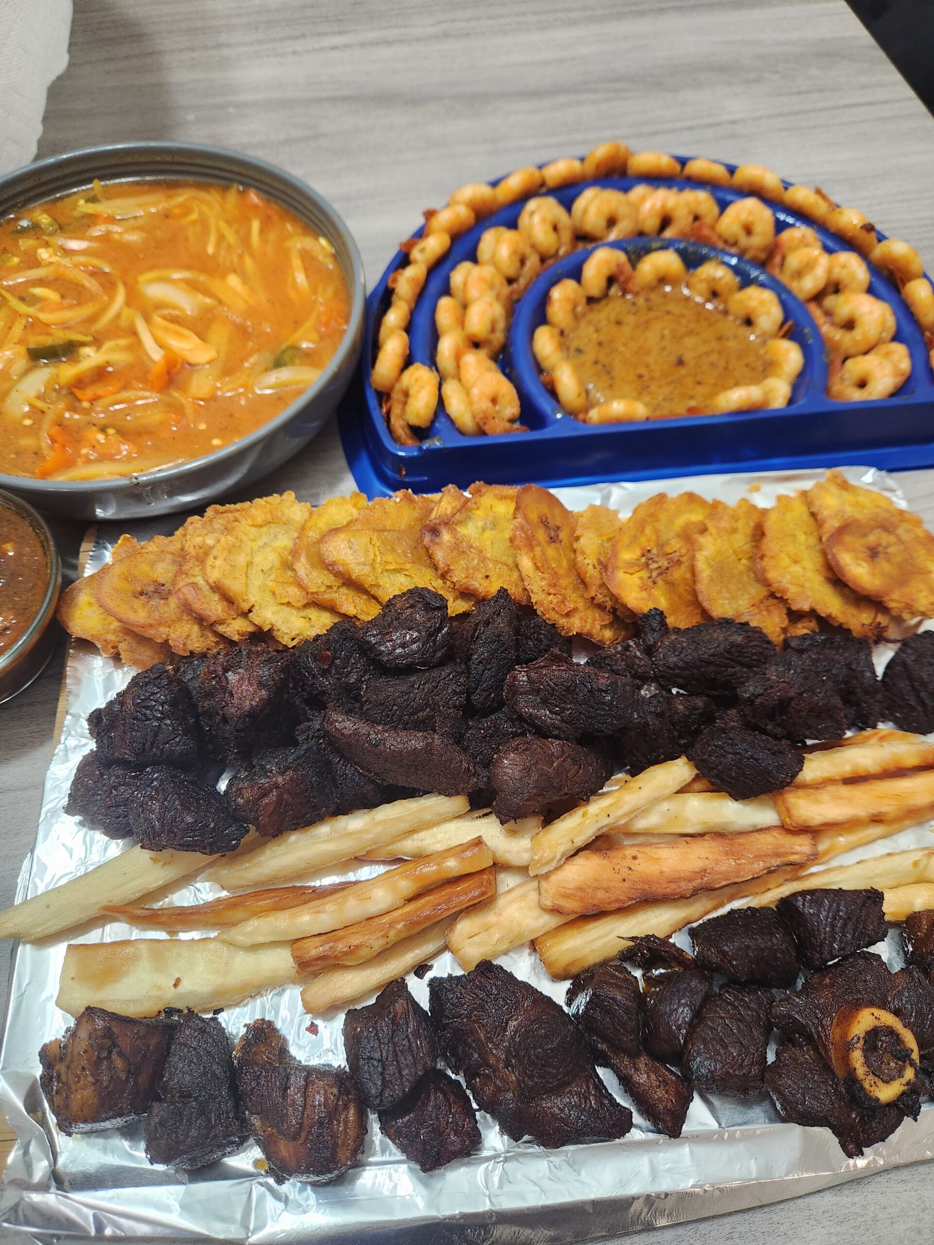 Fried goat, shrimp and plantain/ Taso kabrit